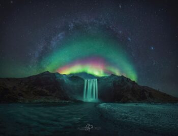 The Milky Way, a Rainbow Aurora, and Stars: A Fairytale Scene at Skógafoss Waterfall 🌌🌈✨