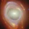 Webb Captures a Rare Cosmic Wonder: Two Galaxies Form a Perfect Einstein Ring ✨